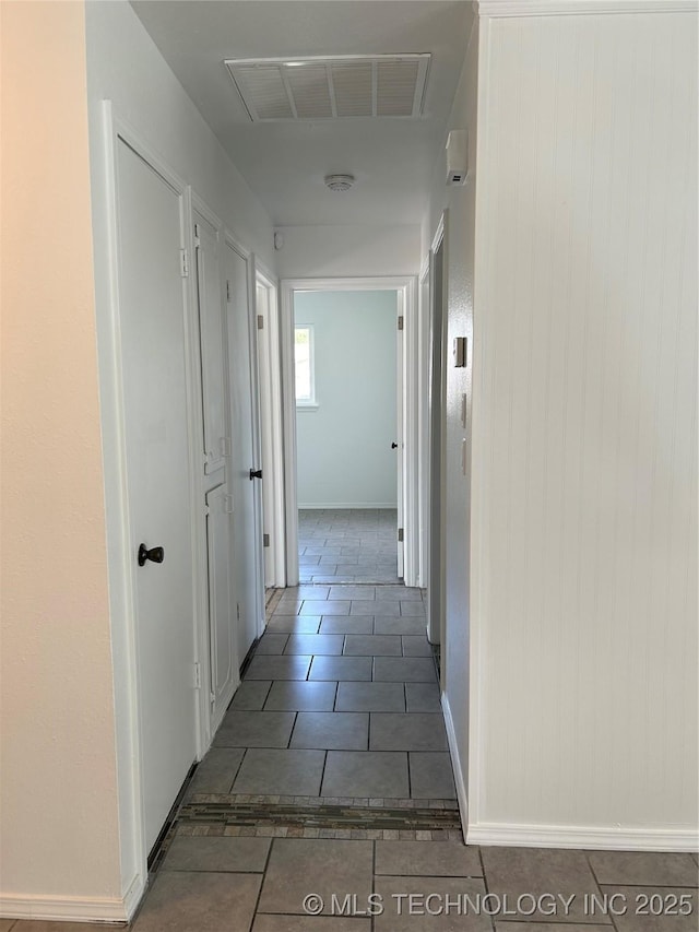 12976 E 32nd St, Tulsa, OK 74134 - hallway featuring tile patterned flooring