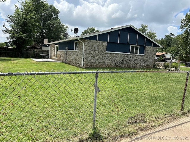 12976 E 32nd St, Tulsa, OK 74134 - view of side of property featuring stone siding
