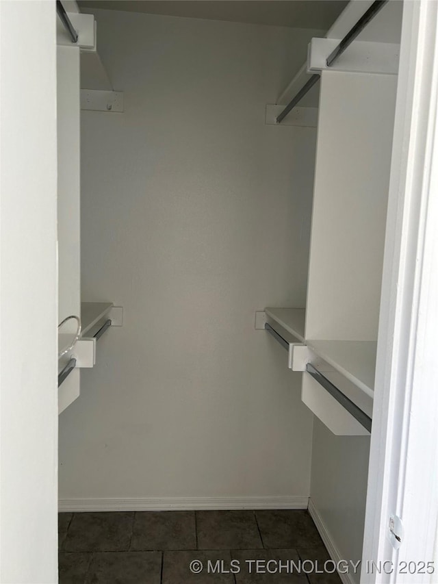 12976 E 32nd St, Tulsa, OK 74134 - spacious closet with tile patterned floors