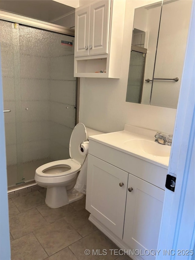 12976 E 32nd St, Tulsa, OK 74134 - bathroom featuring vanity, a stall shower, and tile patterned flooring