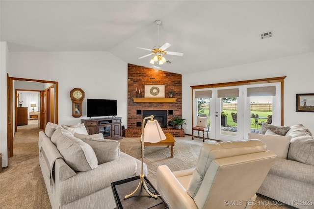 4556 E 330th Rd, Talala, OK 74080 - living room with lofted ceiling, light colored carpet, ceiling fan, and a fireplace