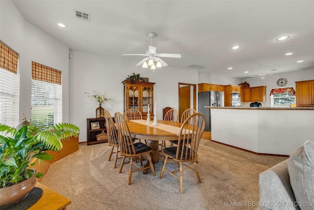 4556 E 330th Rd, Talala, OK 74080 - dining space featuring light colored carpet, ceiling fan, plenty of natural light, and recessed lighting