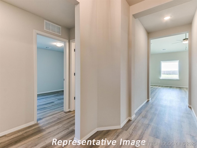 7218 E 132nd St S, Bixby, OK 74008 - hallway with wood finished floors and baseboards