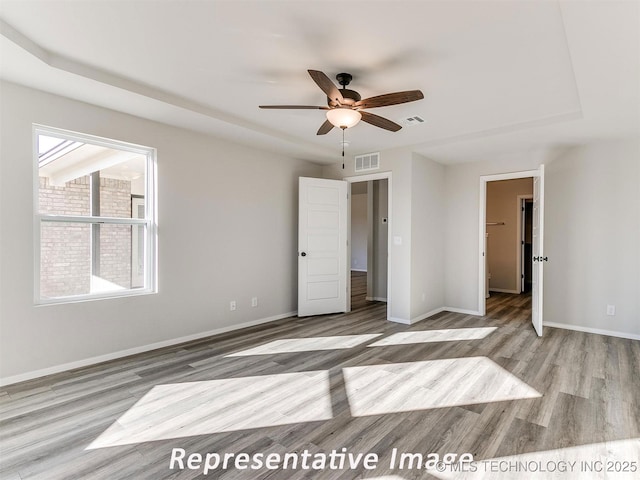 7218 E 132nd St S, Bixby, OK 74008 - unfurnished bedroom featuring wood finished floors and a ceiling fan