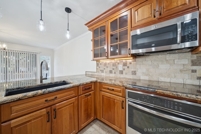 6002 S Atlanta Ct Unit 2, Tulsa, OK 74105 - kitchen with appliances with stainless steel finishes, brown cabinets, ornamental molding, backsplash, and light stone counters