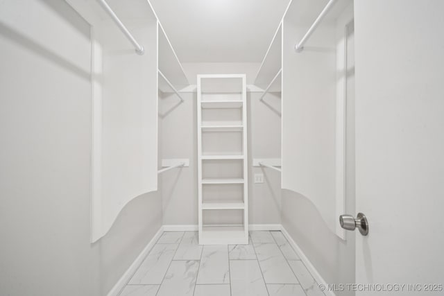 6002 S Atlanta Ct Unit 2, Tulsa, OK 74105 - spacious closet featuring marble finish flooring