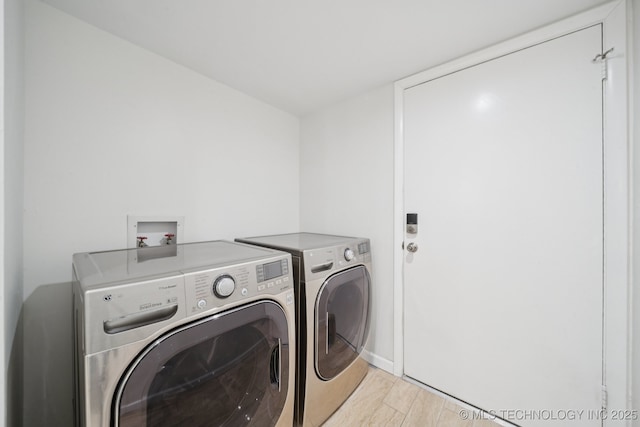 6002 S Atlanta Ct Unit 2, Tulsa, OK 74105 - laundry room featuring washer and dryer and baseboards