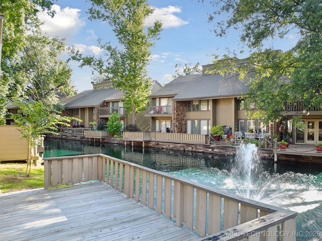 6002 S Atlanta Ct Unit 2, Tulsa, OK 74105 - wooden deck with a water view and a residential view