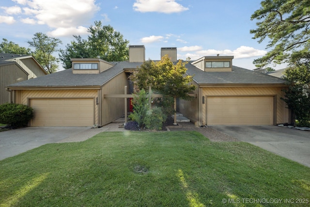 6002 S Atlanta Ct Unit 2, Tulsa, OK 74105 - view of front facade with driveway, a front lawn, and a garage