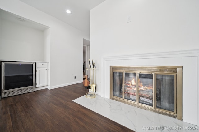 6002 S Atlanta Ct Unit 2, Tulsa, OK 74105 - living room with wine cooler, dark wood-style flooring, and recessed lighting