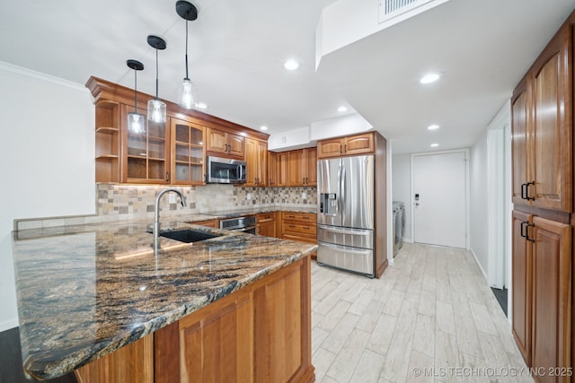 6002 S Atlanta Ct Unit 2, Tulsa, OK 74105 - kitchen featuring appliances with stainless steel finishes, brown cabinets, glass insert cabinets, dark stone countertops, and decorative backsplash