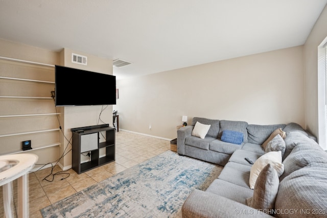6152 S Madison Pl Unit B, Tulsa, OK 74136 - living area with light tile patterned flooring and baseboards