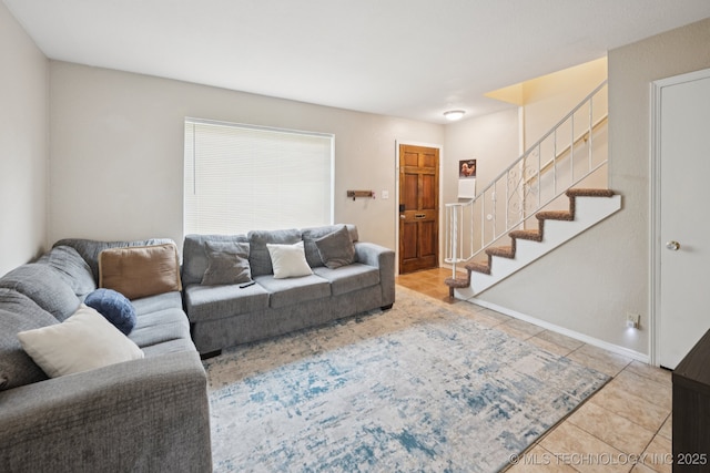 6152 S Madison Pl Unit B, Tulsa, OK 74136 - living area with tile patterned floors and stairs