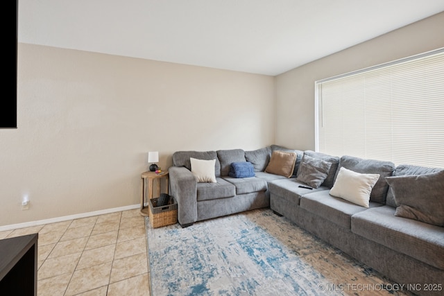 6152 S Madison Pl Unit B, Tulsa, OK 74136 - living area with baseboards and light tile patterned floors