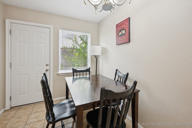 6152 S Madison Pl Unit B, Tulsa, OK 74136 - dining space featuring a chandelier and light tile patterned flooring