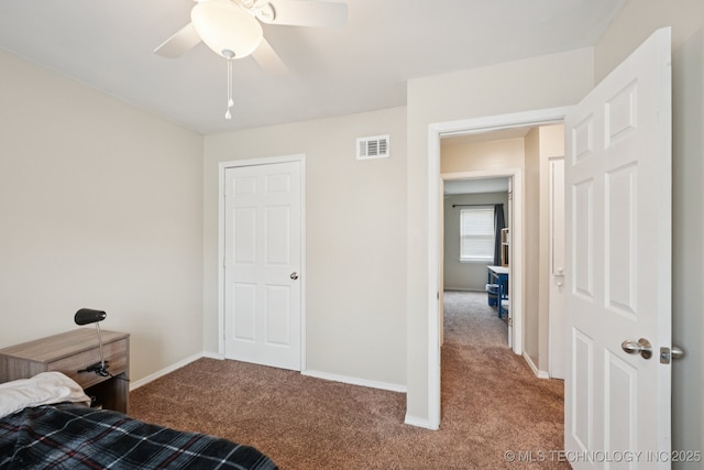 6152 S Madison Pl Unit B, Tulsa, OK 74136 - carpeted bedroom with baseboards and a ceiling fan