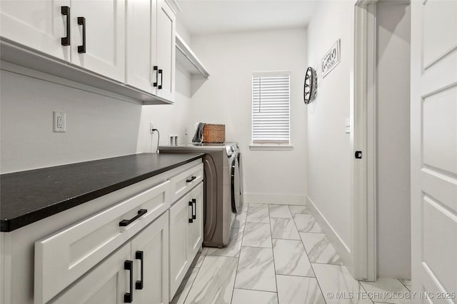 2035 E 138th Pl S, Bixby, OK 74008 - laundry area featuring separate washer and dryer, light marble finish flooring, and cabinet space