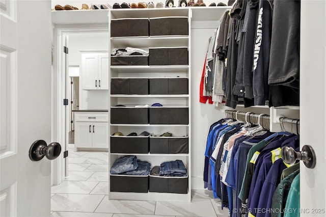 2035 E 138th Pl S, Bixby, OK 74008 - spacious closet featuring light marble finish floors