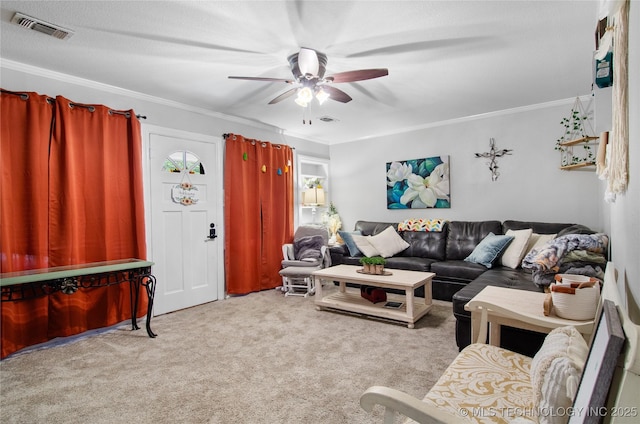 925 W Cedar St N, Durant, OK 74701 - living room featuring ceiling fan, carpet, and crown molding