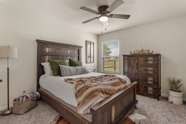 2407 W Union Pl, Collinsville, OK 74021 - bedroom with light carpet and a ceiling fan