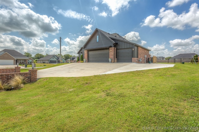 2407 W Union Pl, Collinsville, OK 74021 - view of side of property with brick siding, board and batten siding, a garage, concrete driveway, and a residential view