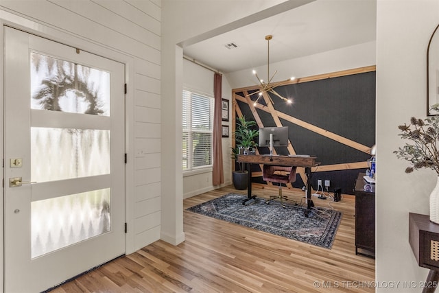 2407 W Union Pl, Collinsville, OK 74021 - foyer entrance featuring wood finished floors and a chandelier