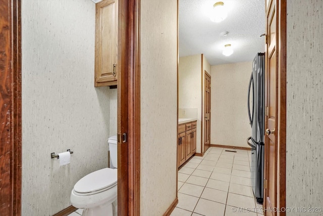 2425 E 53rd St, Tulsa, OK 74105 - half bathroom featuring vanity and tile patterned floors