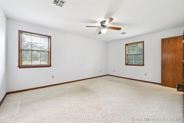 32069 Meadow Ln, Mannford, OK 74044 - empty room with a ceiling fan and light colored carpet