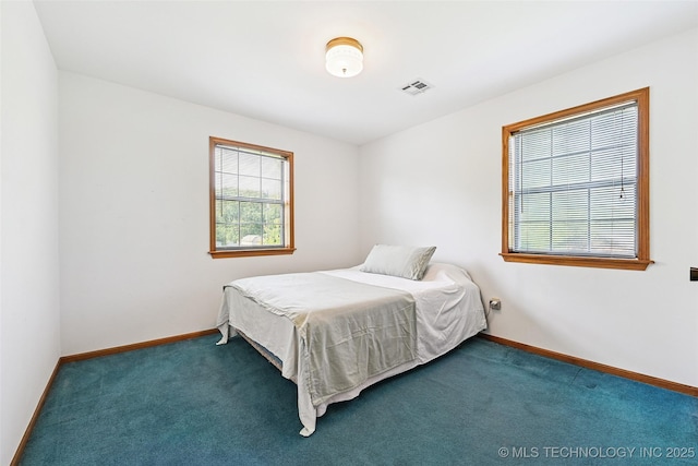32069 Meadow Ln, Mannford, OK 74044 - bedroom with carpet and baseboards