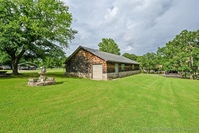 32069 Meadow Ln, Mannford, OK 74044 - view of grassy yard with a garage