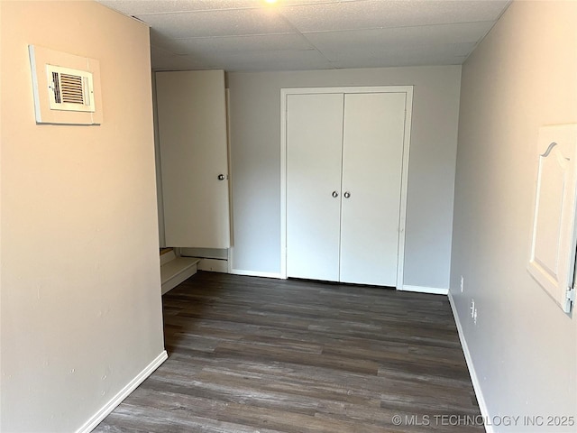 5940 E 3rd St, Tulsa, OK 74112 - unfurnished bedroom featuring wood finished floors and a closet