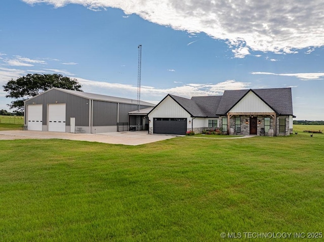 2724 Lark Rd, Kingston, OK 73439 - view of front of house featuring a front lawn, a garage, driveway, and stone siding