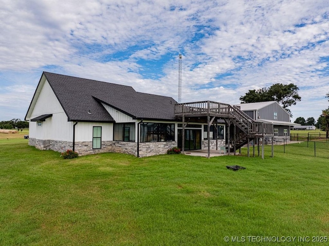 2724 Lark Rd, Kingston, OK 73439 - back of house with a shingled roof, a wooden deck, stone siding, stairway, and a patio area