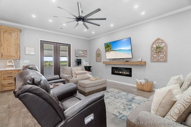 2724 Lark Rd, Kingston, OK 73439 - living room with ceiling fan, recessed lighting, crown molding, a glass covered fireplace, and light wood-type flooring