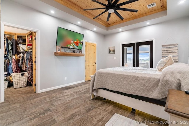 2724 Lark Rd, Kingston, OK 73439 - bedroom with a raised ceiling, wooden ceiling, a spacious closet, wood finished floors, and recessed lighting
