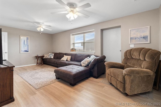 2724 Lark Rd, Kingston, OK 73439 - living area featuring a ceiling fan and light wood-style flooring