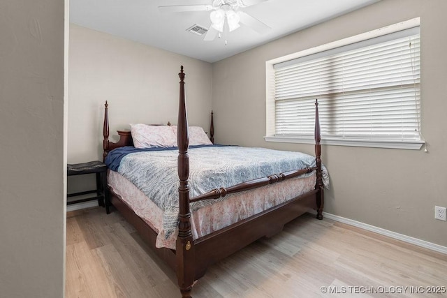 2724 Lark Rd, Kingston, OK 73439 - bedroom with wood finished floors and ceiling fan