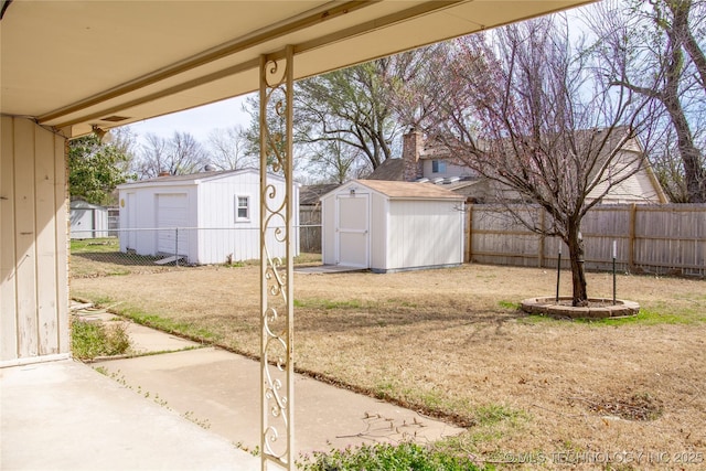 6740 E 51st Pl, Tulsa, OK 74145 - fenced backyard with a storage shed and a patio
