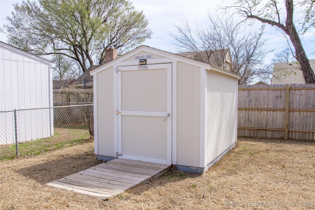 6740 E 51st Pl, Tulsa, OK 74145 - view of shed with a fenced backyard
