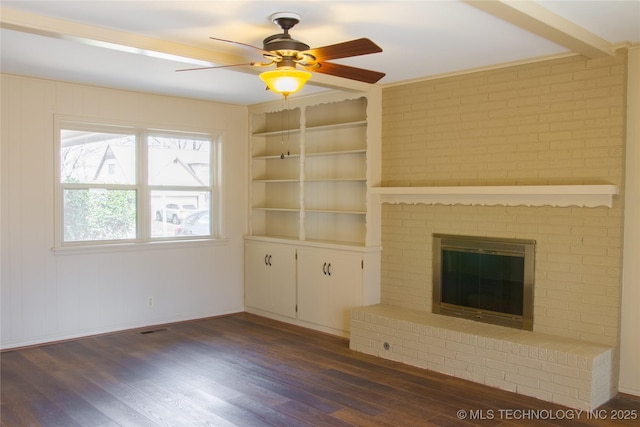 6740 E 51st Pl, Tulsa, OK 74145 - unfurnished living room with dark wood finished floors, ceiling fan, and a brick fireplace