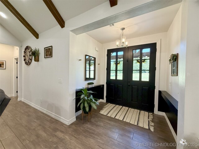 18040 County Road 1558, Ada, OK 74820 - foyer entrance featuring a chandelier and wood finished floors