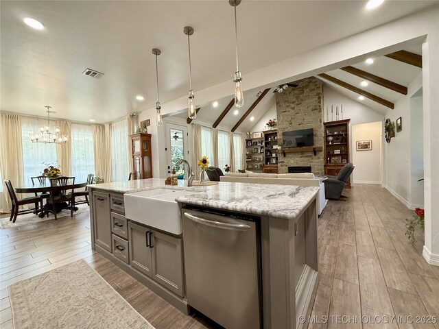 18040 County Road 1558, Ada, OK 74820 - kitchen featuring dishwasher, gray cabinets, a fireplace, light stone countertops, and recessed lighting