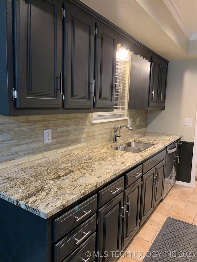 11810 E 83rd St, Owasso, OK 74055 - kitchen with stainless steel dishwasher, backsplash, and light stone counters
