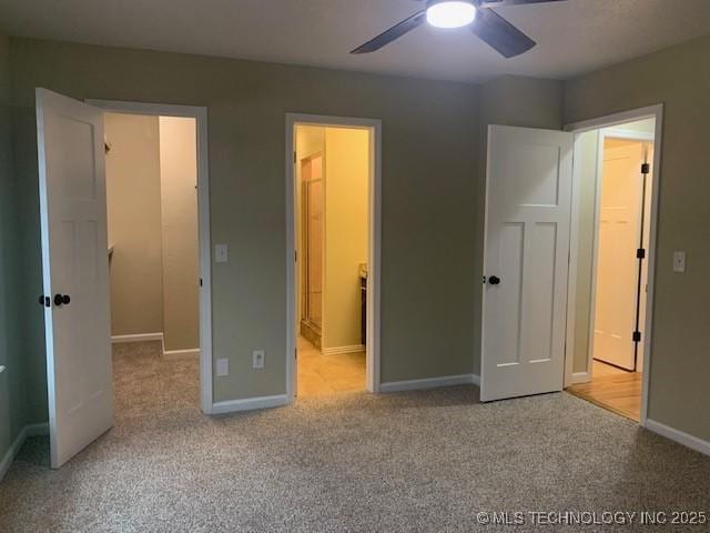 11810 E 83rd St, Owasso, OK 74055 - unfurnished bedroom with carpet floors, ensuite bathroom, and ceiling fan