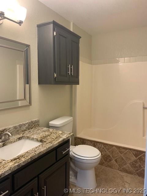 11810 E 83rd St, Owasso, OK 74055 - bathroom with vanity, shower / bath combination, and tile patterned flooring