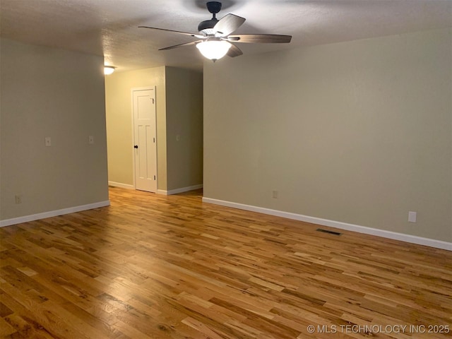 11810 E 83rd St, Owasso, OK 74055 - unfurnished room featuring a ceiling fan and light wood-type flooring