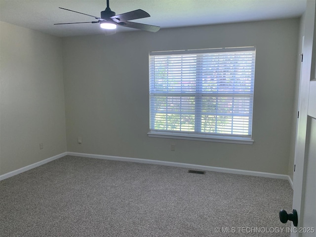 11810 E 83rd St, Owasso, OK 74055 - unfurnished room with carpet floors, healthy amount of natural light, and a ceiling fan