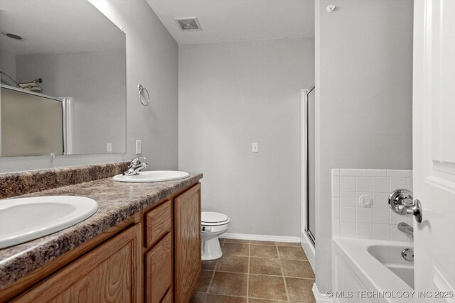 40 E Fairlane Pl, Sapulpa, OK 74066 - full bathroom featuring a stall shower, a bath, double vanity, and tile patterned floors