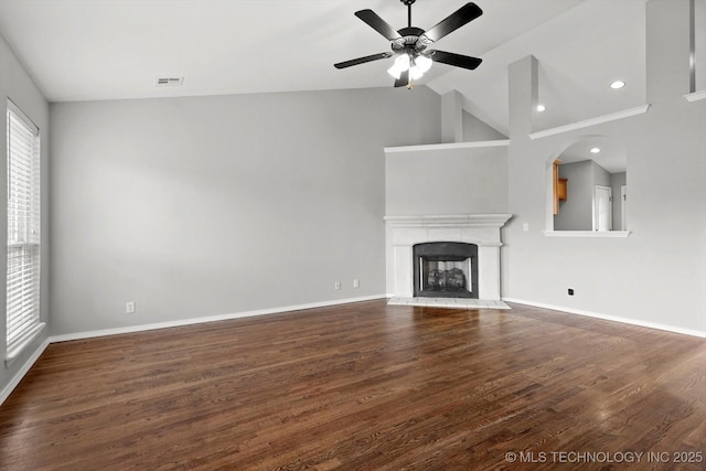 40 E Fairlane Pl, Sapulpa, OK 74066 - unfurnished living room featuring a ceiling fan, dark wood finished floors, a fireplace with raised hearth, recessed lighting, and high vaulted ceiling