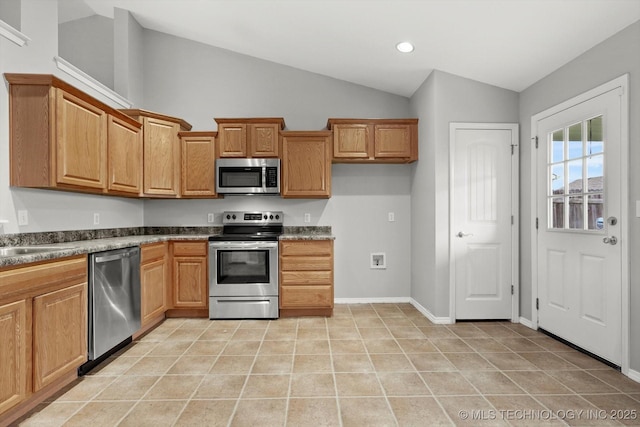 40 E Fairlane Pl, Sapulpa, OK 74066 - kitchen featuring appliances with stainless steel finishes, vaulted ceiling, light tile patterned flooring, recessed lighting, and brown cabinetry